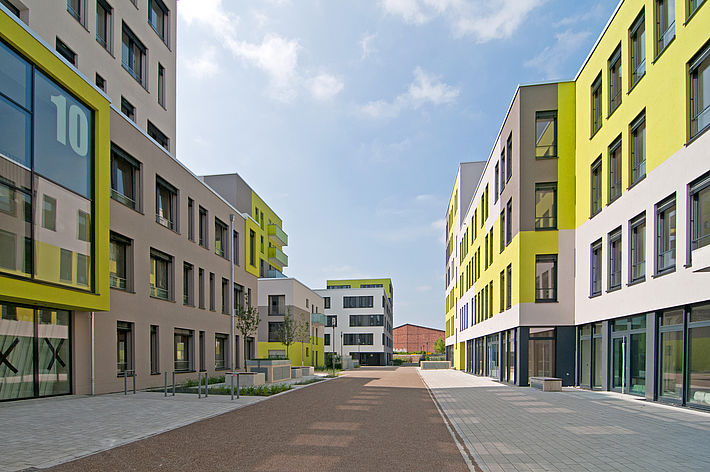 Neubaukomplex Kubikon in grün grau und weiß