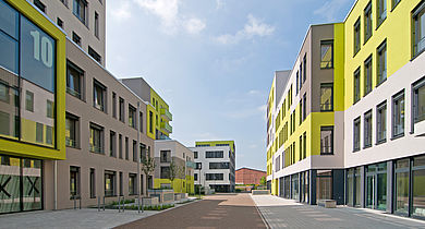 Neubaukomplex Kubikon in grün grau und weiß